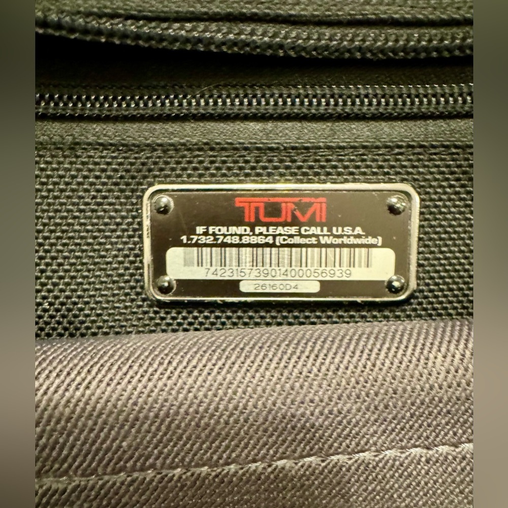 TUMI black laptop carrier bag. It has wallet inside.  It has various - Picture 7 of 15